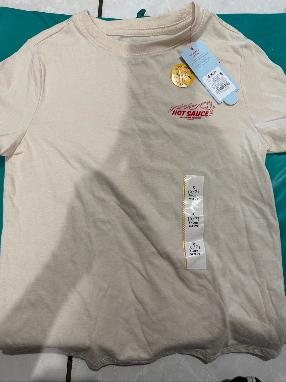 Cat & Jack Cream Short Sleeve Tee with Red Hot Sauce Graphic